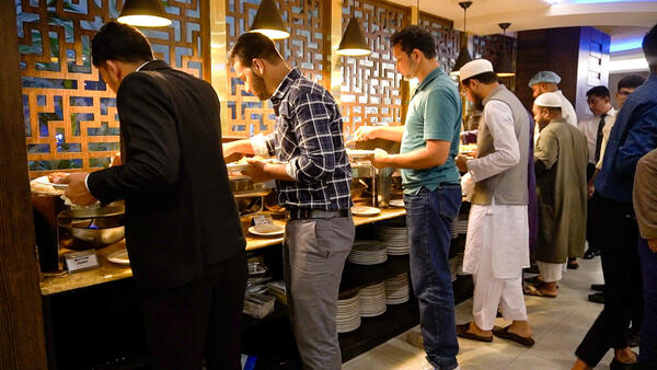 Photo with Customer Support team at dinner party